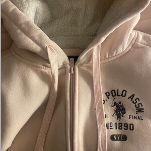 Pale baby pink polo zip up with fuzzy insidee